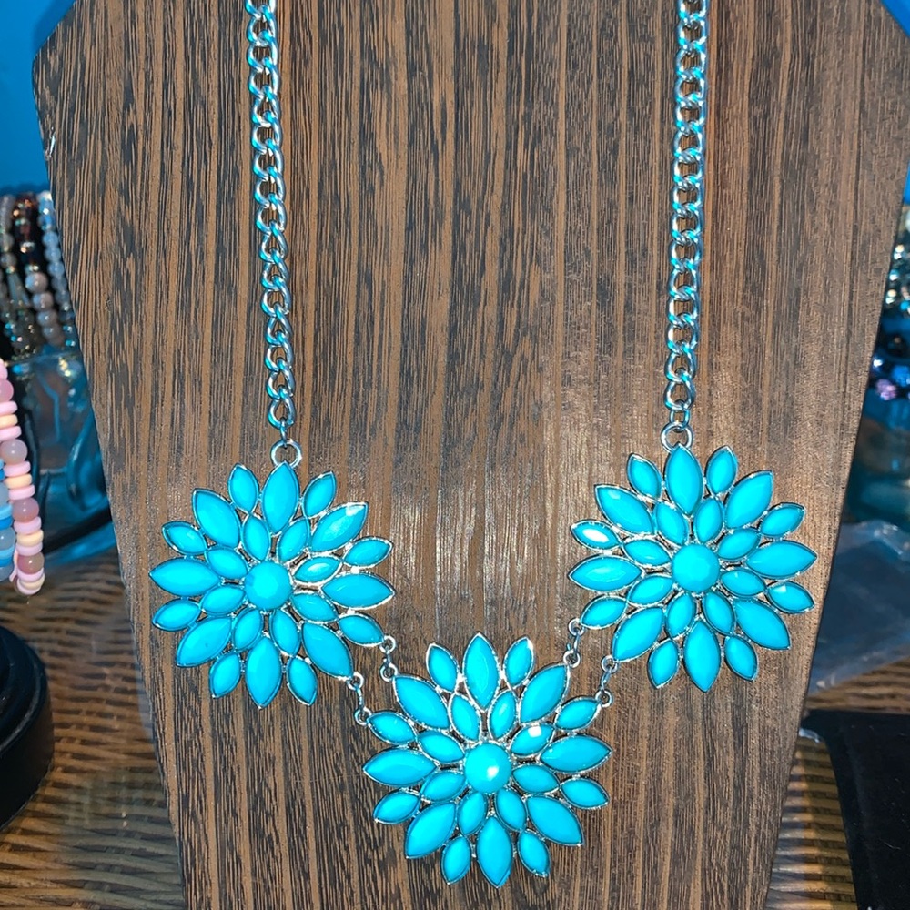turquoise colored flowers statement necklace